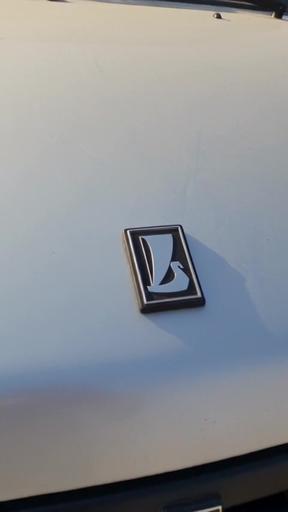 Seedance 2.5: Scene: A sunny, hot day in Dubai. A single dusty car from @image1 @image2 @image3 stands parked on an empty, sun-bleache